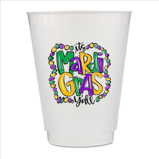 A white plastic cup with a colorful design featuring the text "It's Mardi Gras Yell" surrounded by beads in shades of green, purple, and yellow.