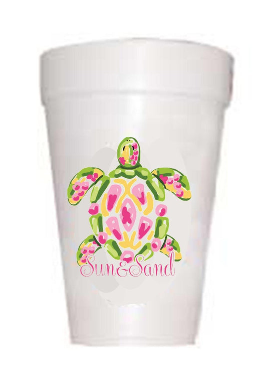 sea turtle on styrofoam cups with sun and sand text