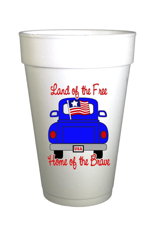 Vintage blue pick up truck saying land of the free