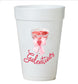 A white foam cup with a graphic design featuring a glass of red wine with a bow and the text "Galentines" written below it.