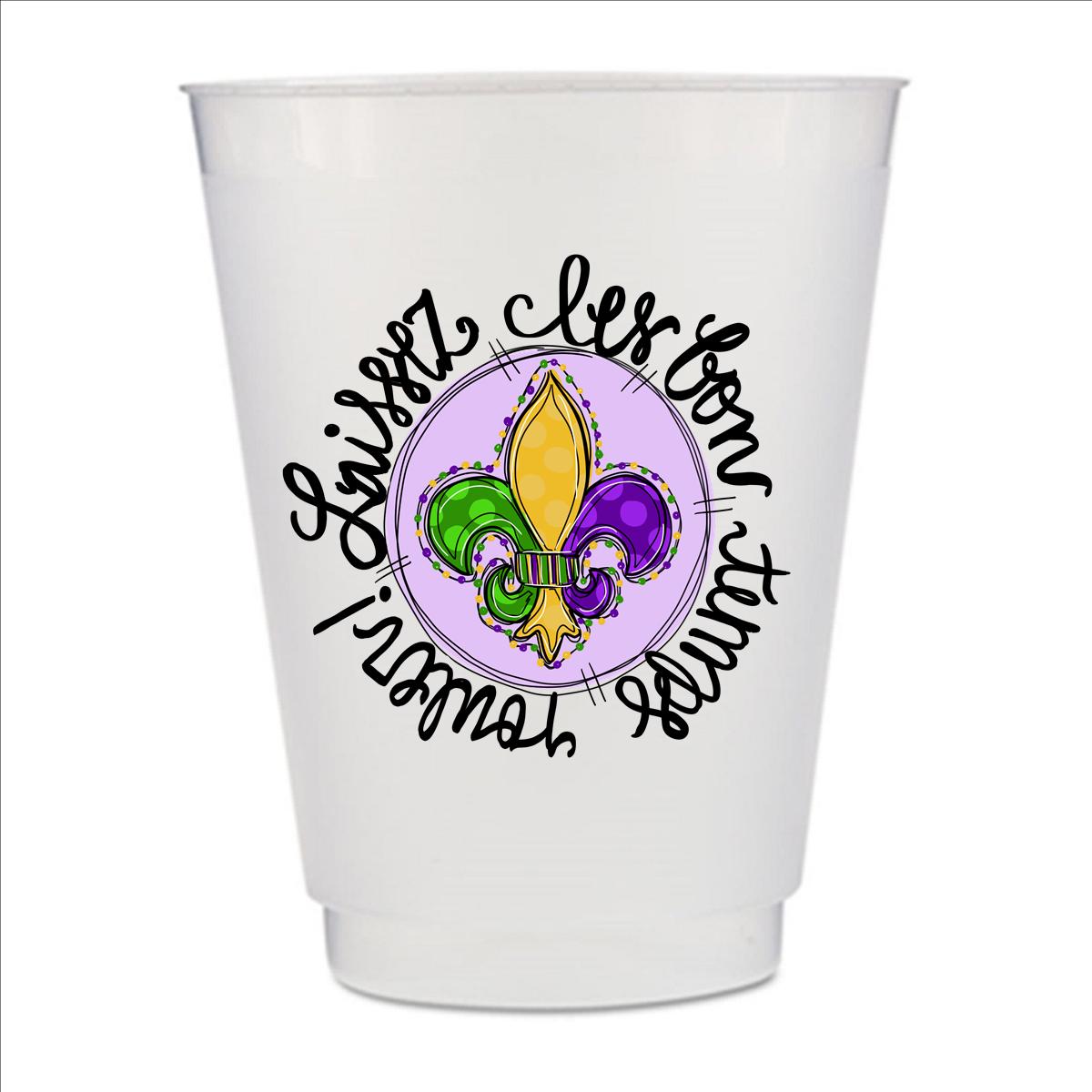 A white plastic cup with a decorative design featuring a colorful fleur-de-lis flower and text around it.