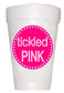 hot pink circle with tickled pink on styrofoam cup